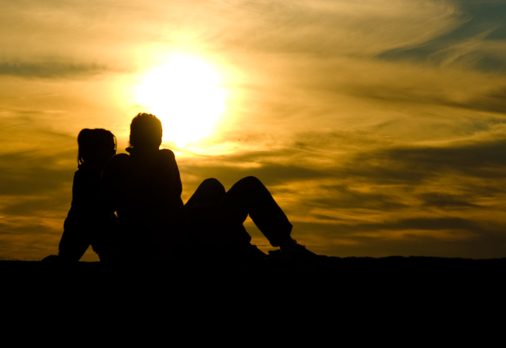 A couple watching sunset from Kalemegdan walls